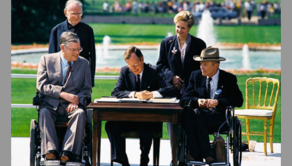 George Bush signs ADA