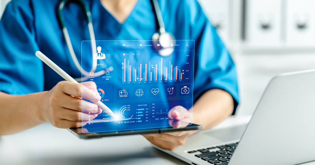 Health care professional in scrubs uses a tablet displaying digital health data, charts, and patient care metrics.